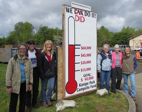 Board members show off, we did it!! 